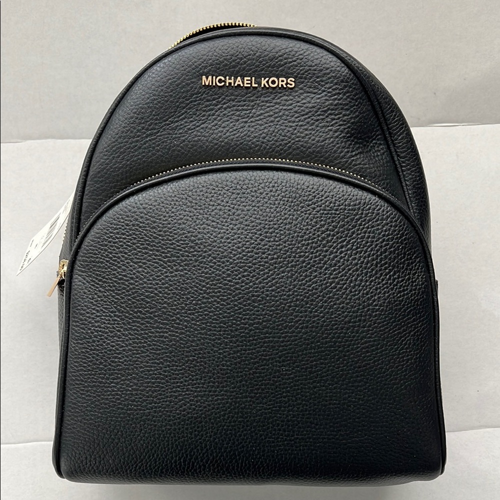 Michael Kors brand new w tags Abbey Black Leather zippered Backpack.